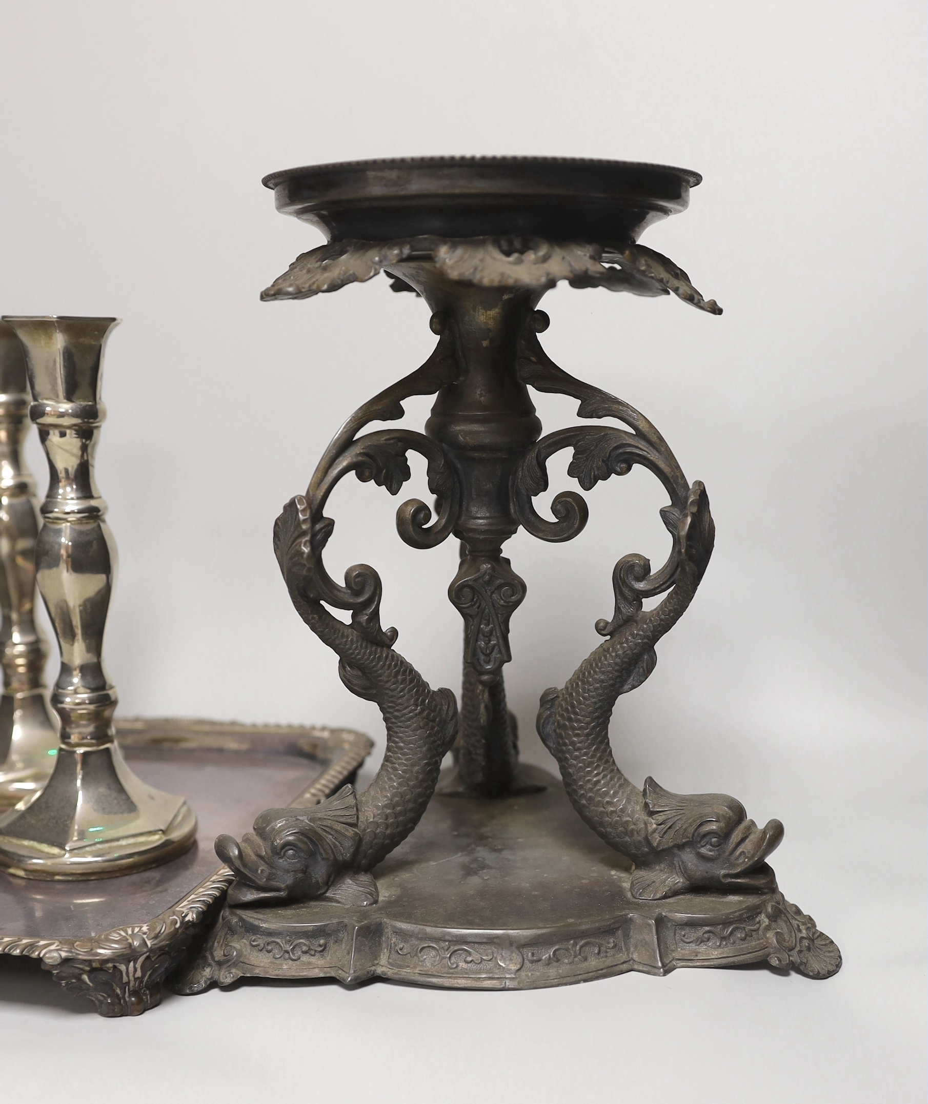 A pair of silver plated Philip Ashberry & Sons dolphin tazza’s, impressed 656 to the bases, together with a tray and pair of candlesticks, the largest each 23cm high